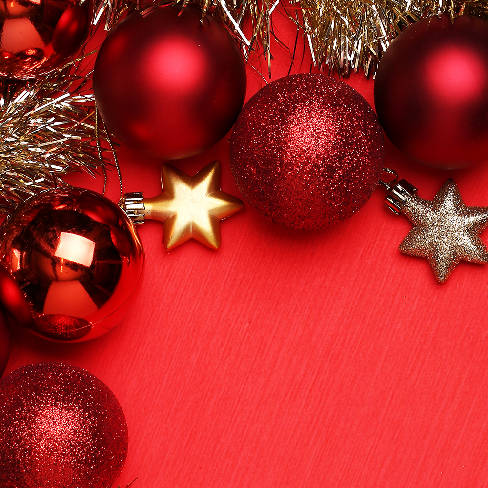 red and gold ornaments on red background