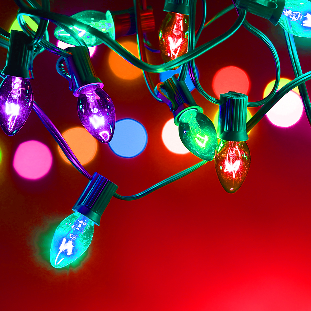 Christmas lights over dark blue background